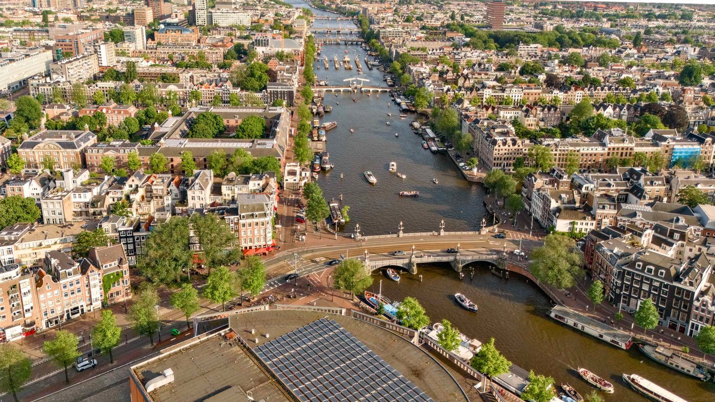 Aerial view of the Amstel with its bridges and canal houses