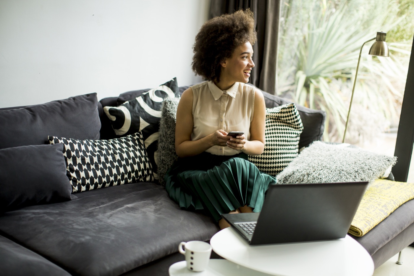 Woman working on a laptop at home