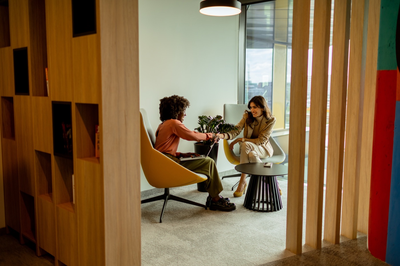 Two friends in a modern apartment